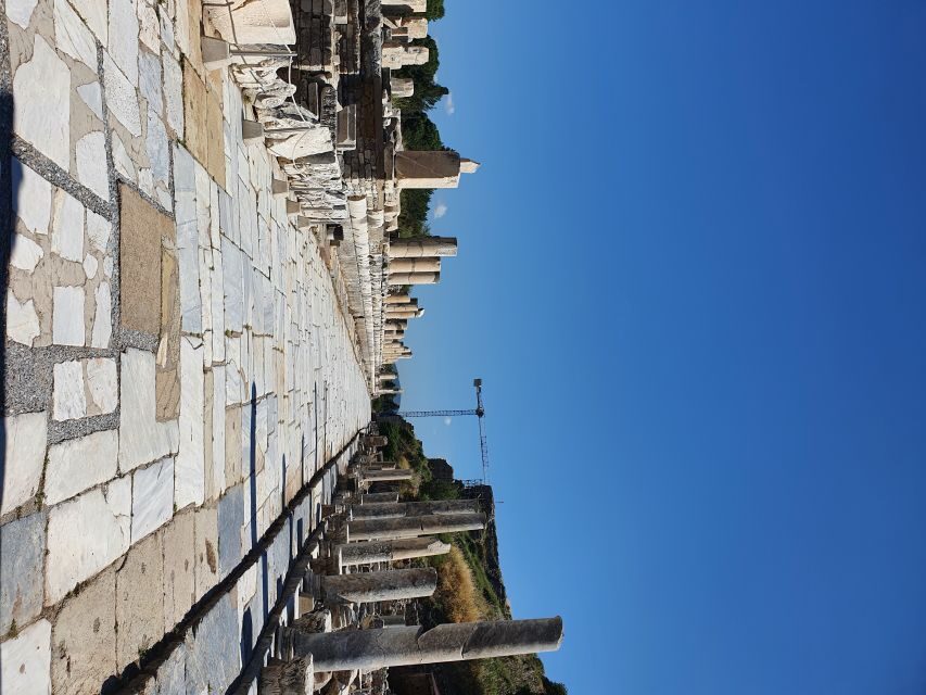 From Izmir: Guided Tour of the Ancient City of Ephesus - Ephesus with a guide: marble streets, the big monuments, and real context
